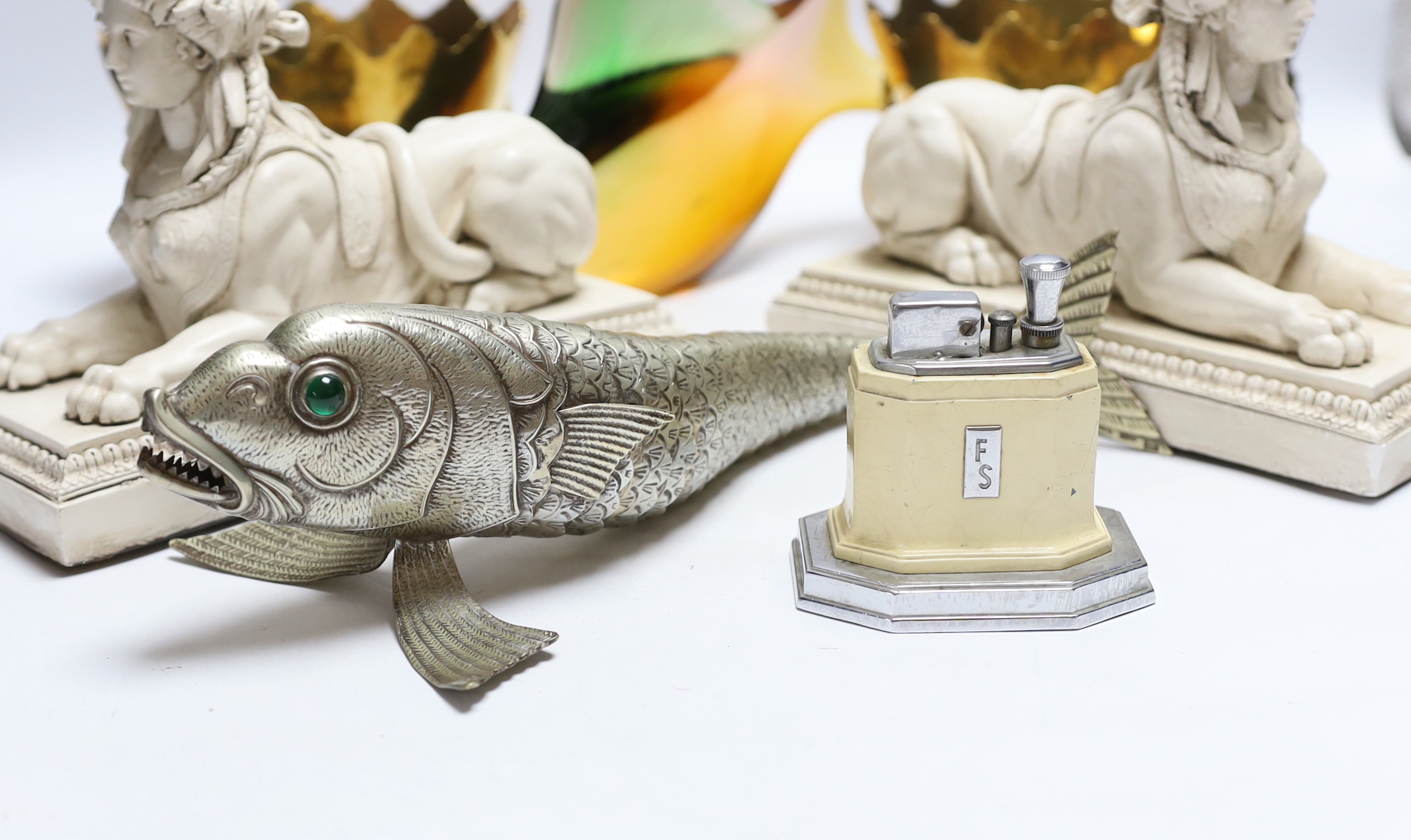 Sundry items including a Czechoslovakian glass fish, a pair of resin Sphinx models and a Chinese white metal articulated fish
